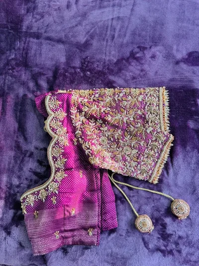 Embroidered bridal blouse with tassels on velvet