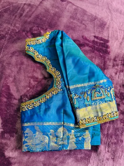 Blue silk blouse with a zari border