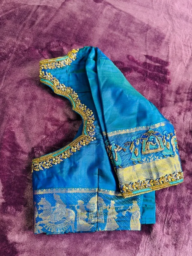 Blue silk blouse with a zari border