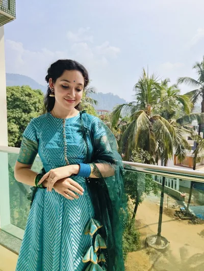 Teal chevron lehenga with a deep green dupatta